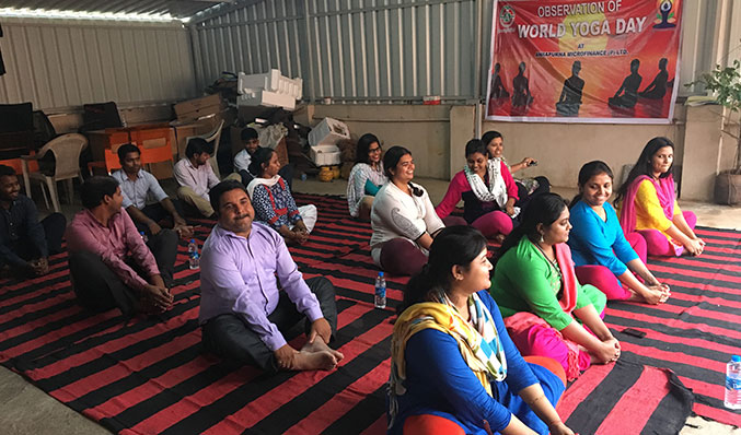AFPL employees showing their enthusiasm while participating in the celebration of 3rd International Yoga Day at its Head Office