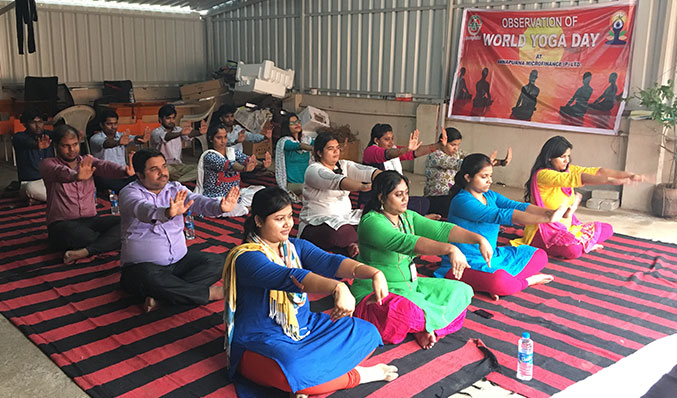AFPL employees showing their enthusiasm while participating in the celebration of 3rd International Yoga Day at its Head Office